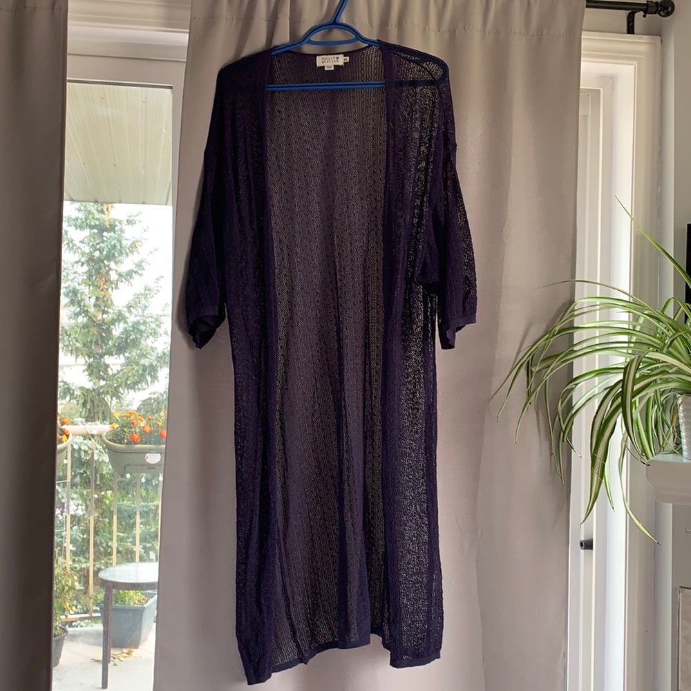 Embroidered long cardigan.